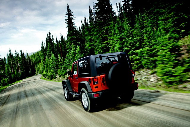 Red Jeep Wrangler on the road