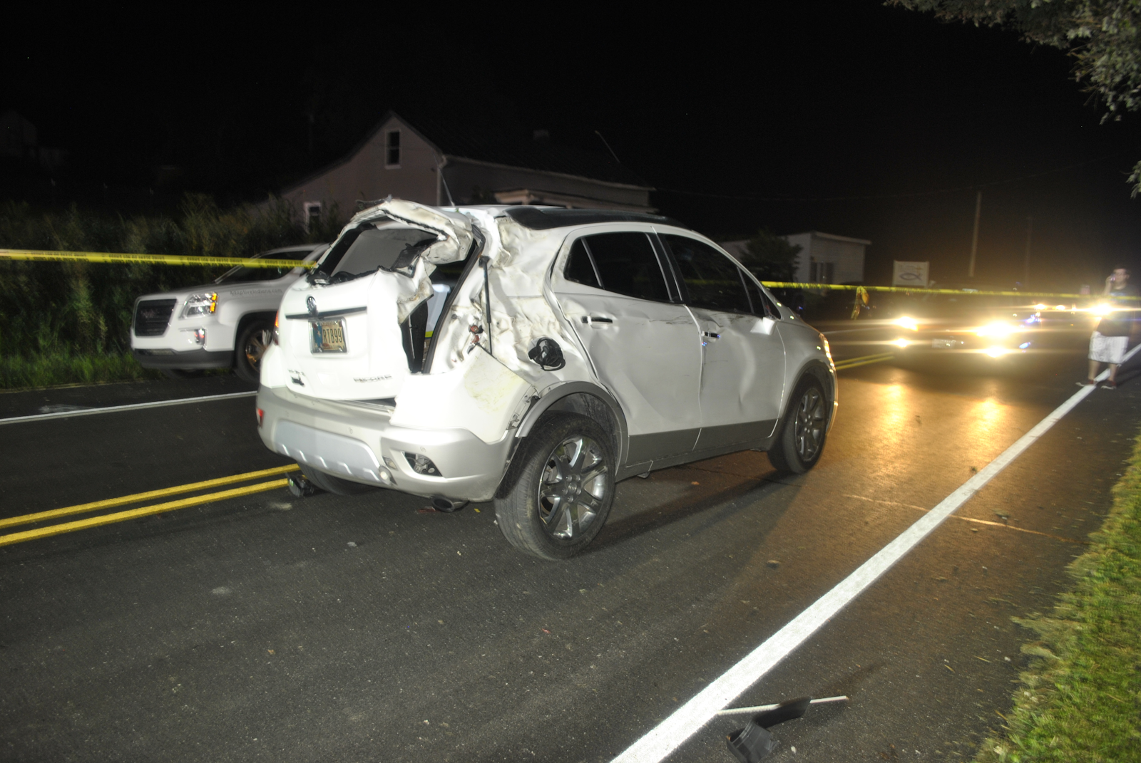 car accident scene in indianapolis, night accident on a busy road, rear end damage