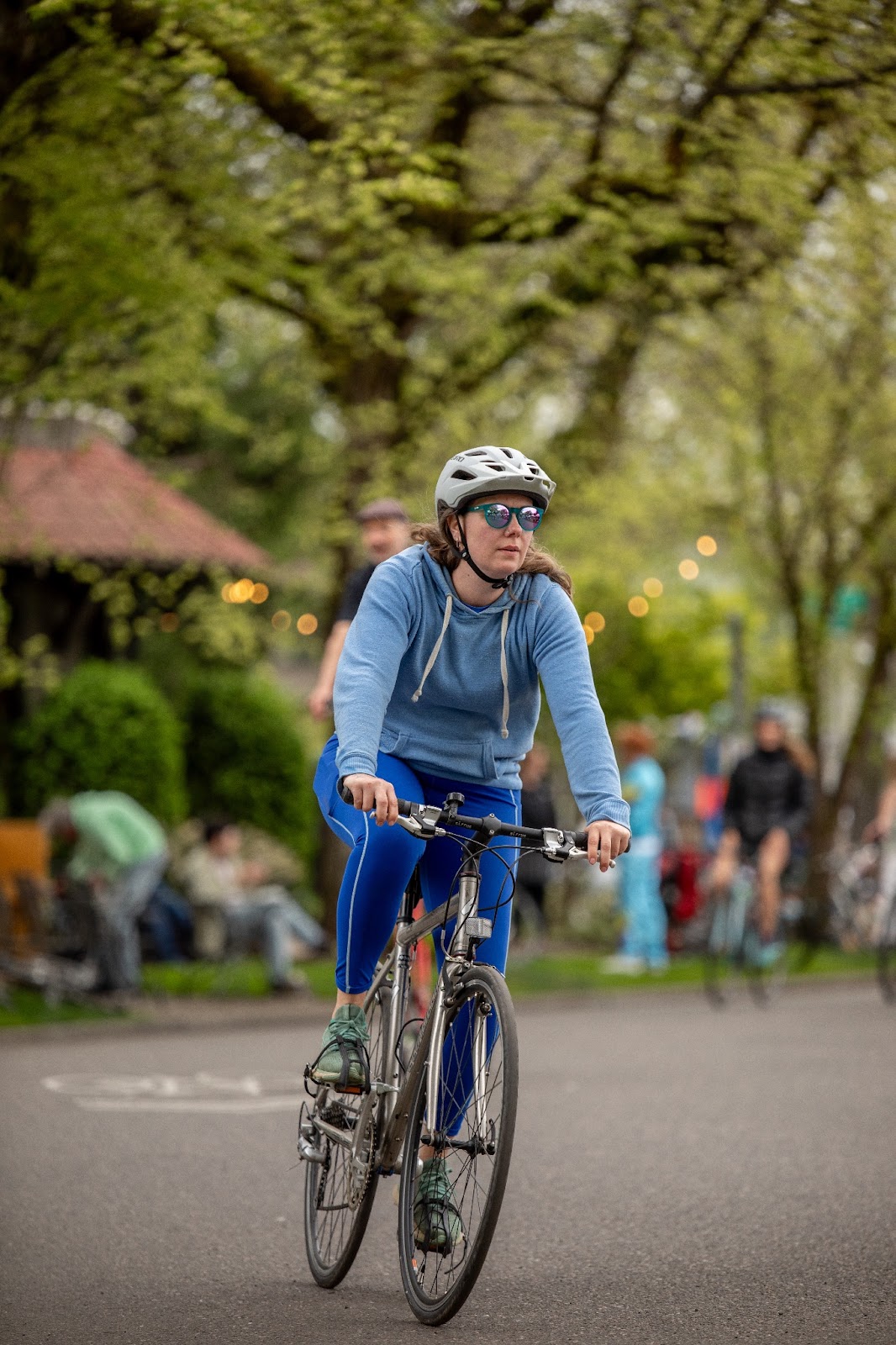 A woman rides her bike in the Ladd's 500 in Portland.