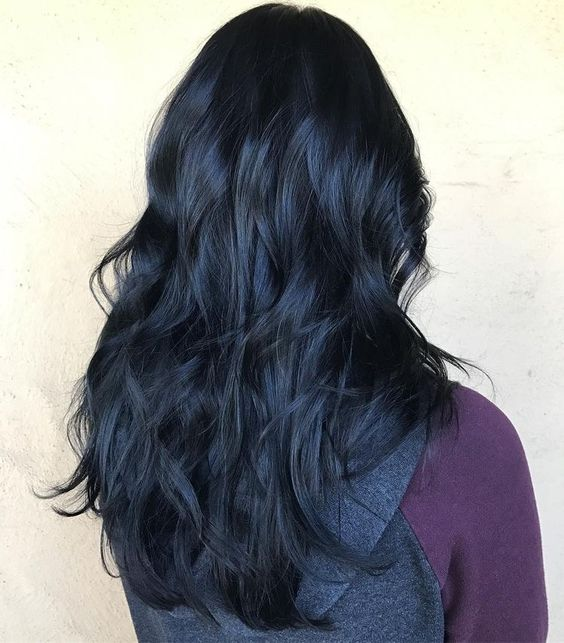 Hair color ideas: Picture of a lady  wearing the inky black hairdo 