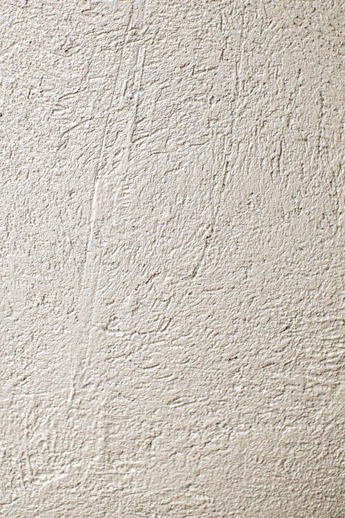 Free Uneven building wall with white stucco Stock Photo