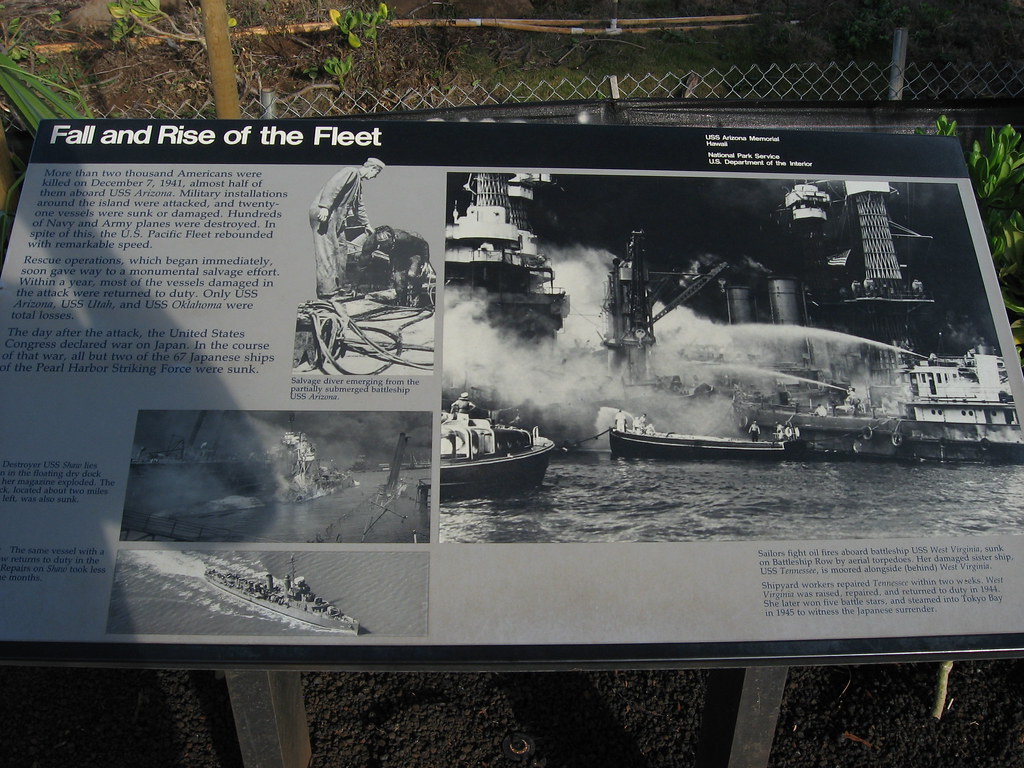 Rise and Fall of the Fleet, Pearl Harbor Historic Sites, Oahu, Hawaii - a sign with a picture of a b