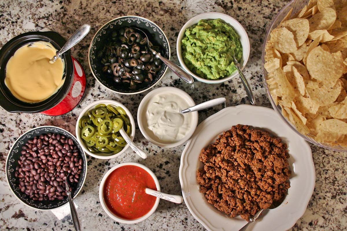 Build-Your-Own Nacho Bar with Homemade Nacho Cheese Sauce & World's Best  Guacamole - Mission Food Adventure