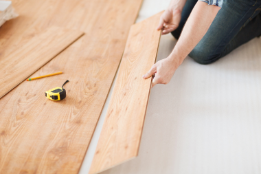 common planning mistakes to avoid for your home remodel remodeler installing floorboards custom built michigan