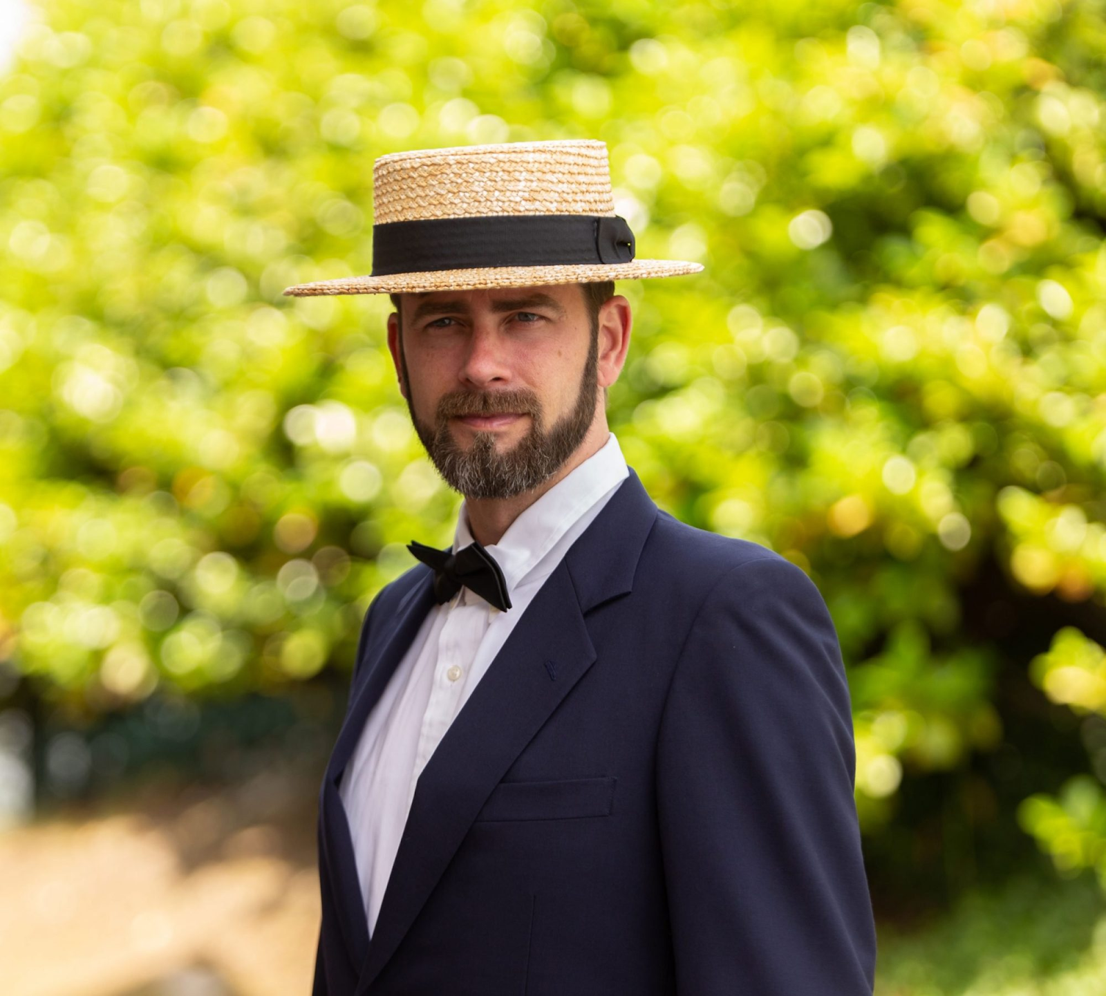 Types of Hat: Picture of a guy rocking a boater hats