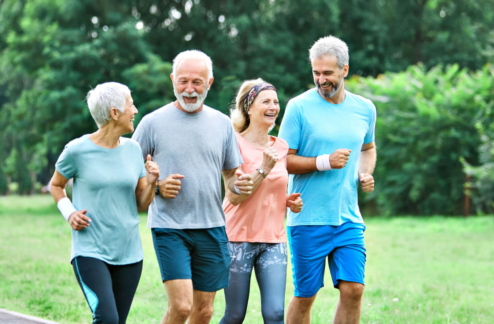 A group of older adults jogging together.