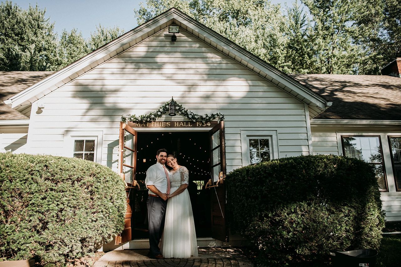 Ben and Sara in front of Matthies Hall, the reception building