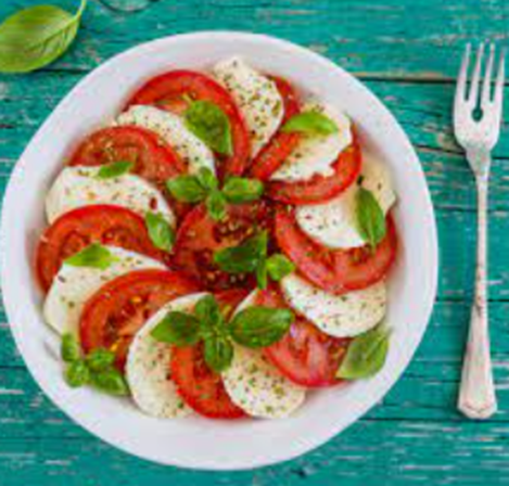 Caprese Salad: A simple salad from the island of Capri made with tomatoes, mozzarella, basil, olive oil, and sometimes balsamic vinegar.