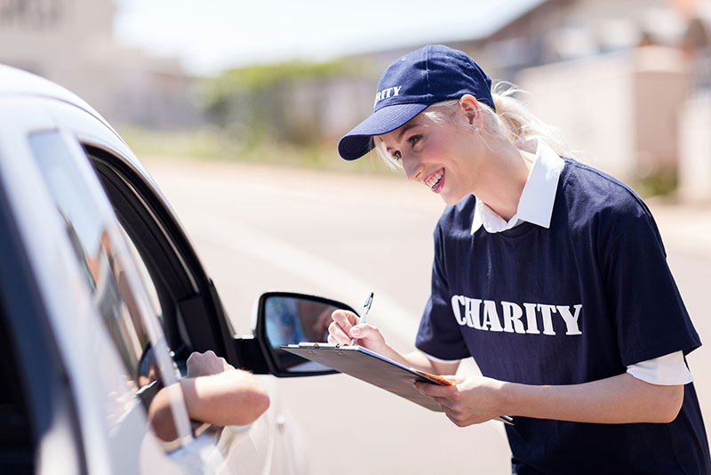 Donate Your Car to Sacramento,
car donation charity worker