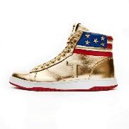 A gold shoe with red white and blue design

Description automatically generated