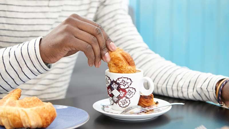 Strange French food customs: dunking baguette or croissant into morning cup of coffee