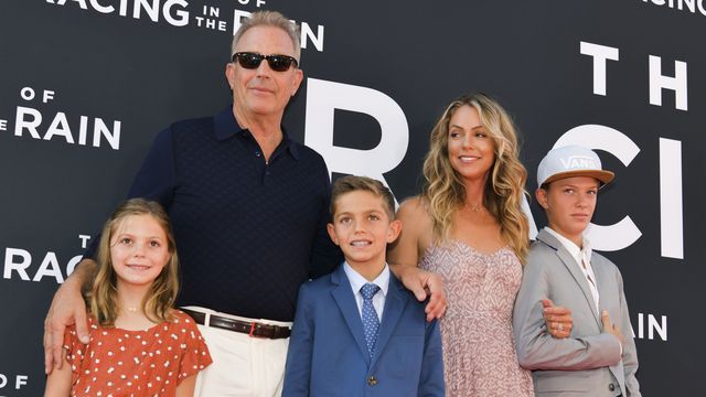Kevin Costner and Christine Baumgartner with their kids
