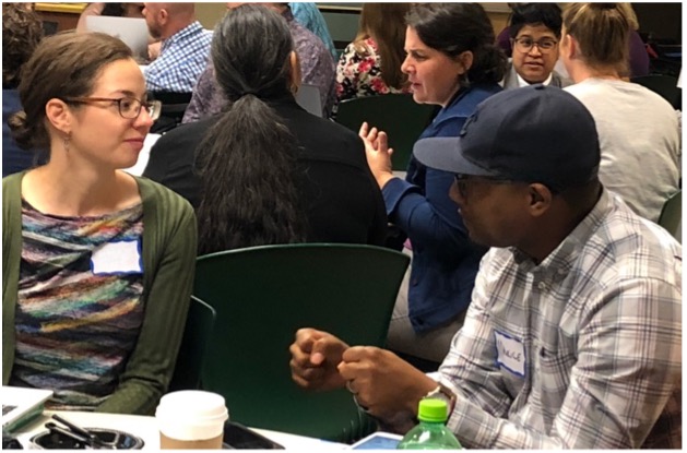 Two people having a discussion during an ABCD workshop