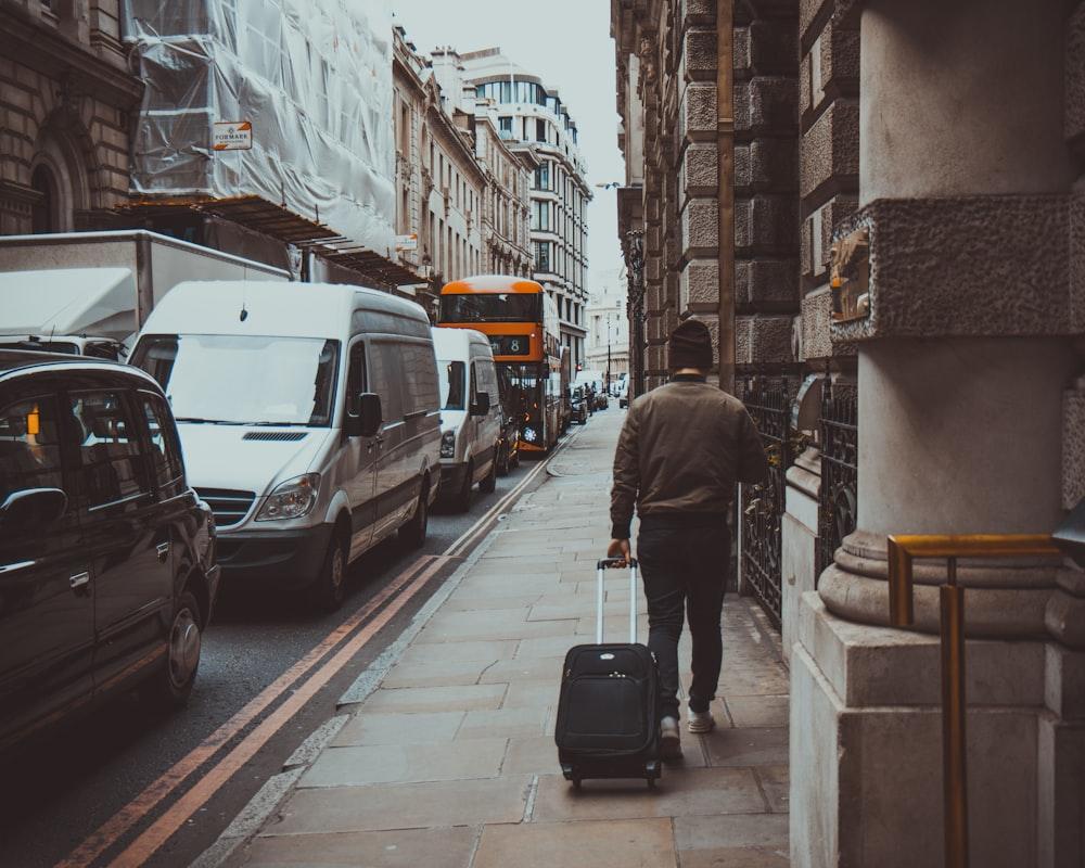 Man With Suitcase Pictures | Download Free Images on Unsplash