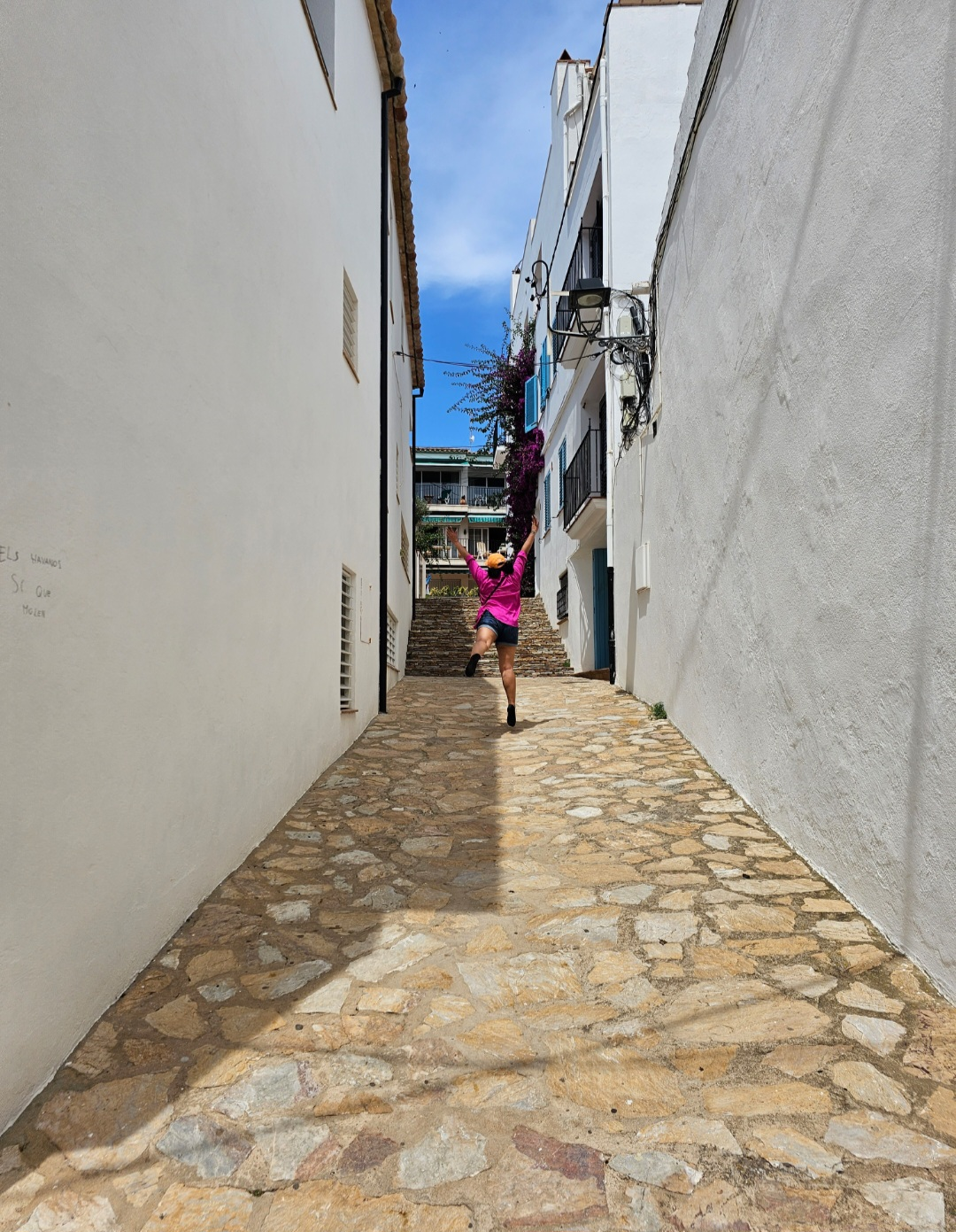 A person running down a narrow alley

Description automatically generated