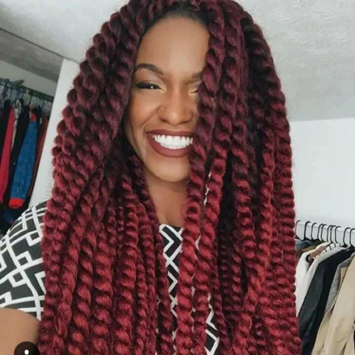 Picture showing a lady rocking a crochet cuban twist