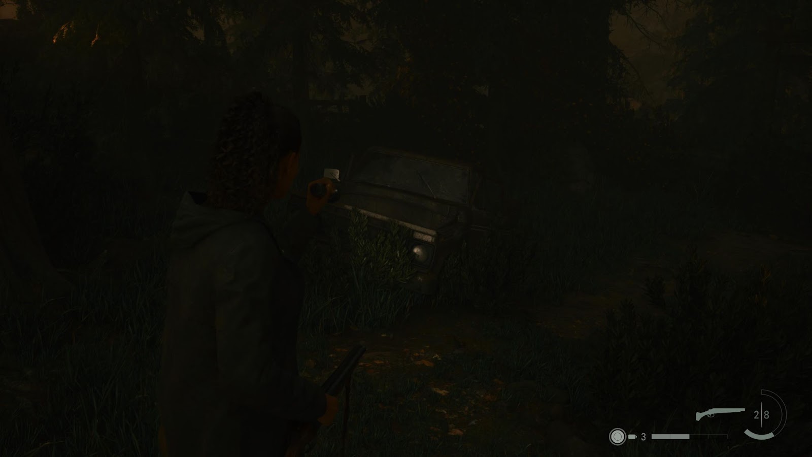 An in game screenshot of the old truck in the rental cabins area in Cauldron Lake from Alan Wake 2