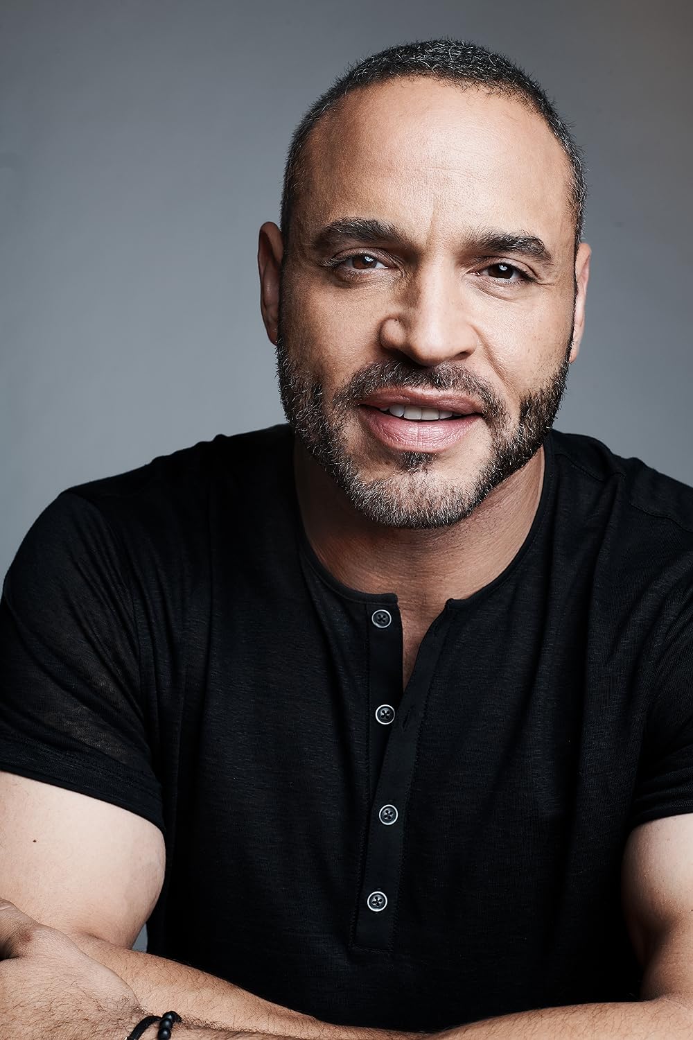 Daniel Sunjata smiling