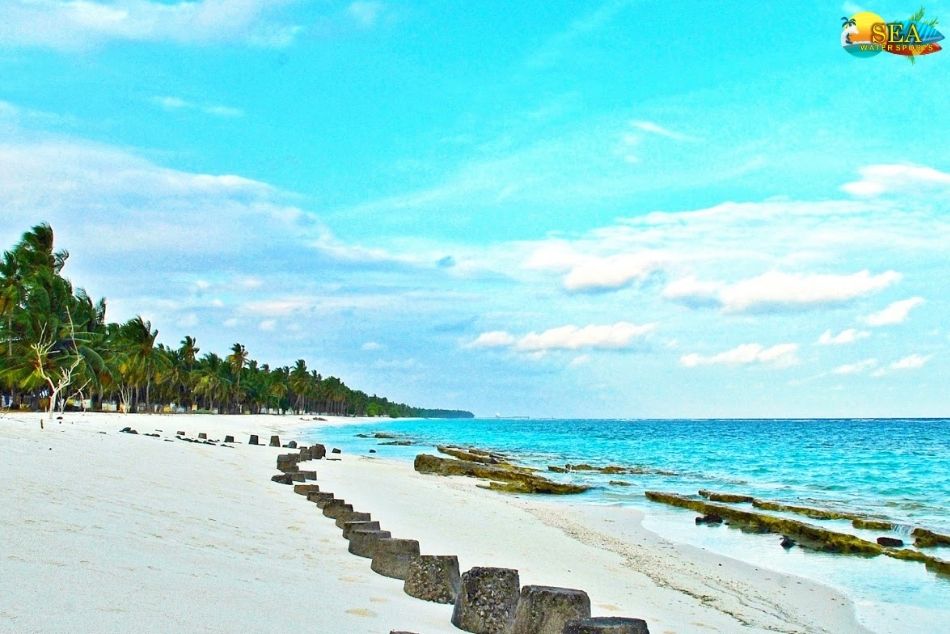 Amini beach view with clear blue waters and peaceful weather