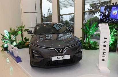 A car on display in a showroom

Description automatically generated