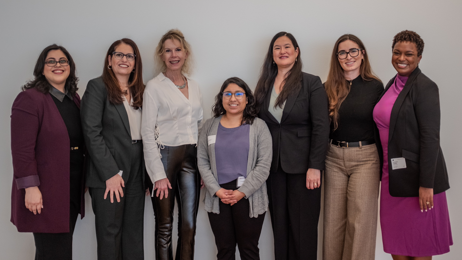 A photograph of the Get Into the Legal Loop 2024 Panelists and Queen’s Bench Mentorship Committee Co-Chairs; from left to right, Linda Anderson, Mentorship Committee Co-Chair; Michèle Bissada; Elizabeth Miles Waring, Liz Sanchez Santiago; Administrative Law Judge Dorothy Chou Proudfoot; Kristen Rovai; and Alexandra Sepolen, Secretary and Mentorship Committee Co-Chair.