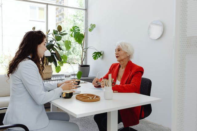 Two person talking on a table