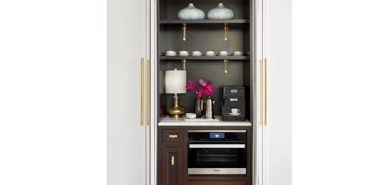 a luxury  home coffee station with golden accessories