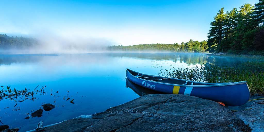 Canoeing in Kawartha Highlands Provincial Park. Portaging and backcountry camping are popular at this Park. 