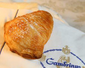 A typical Naples pastry, the sfogiatella, is often eaten with a coffee city cafes.