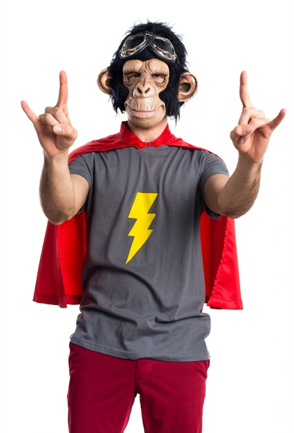 A superhero monkey man making a gesture with his hands. 