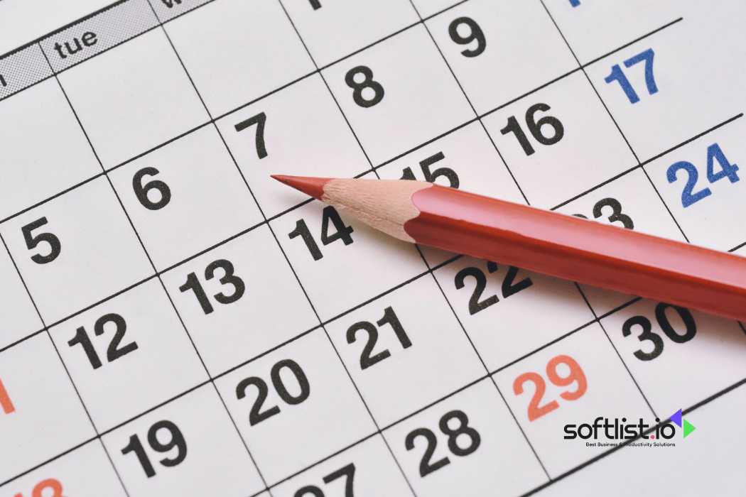 Red pencil on calendar, scheduling concept