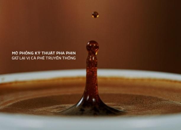 A drop of liquid falling into a cup of coffee

Description automatically generated