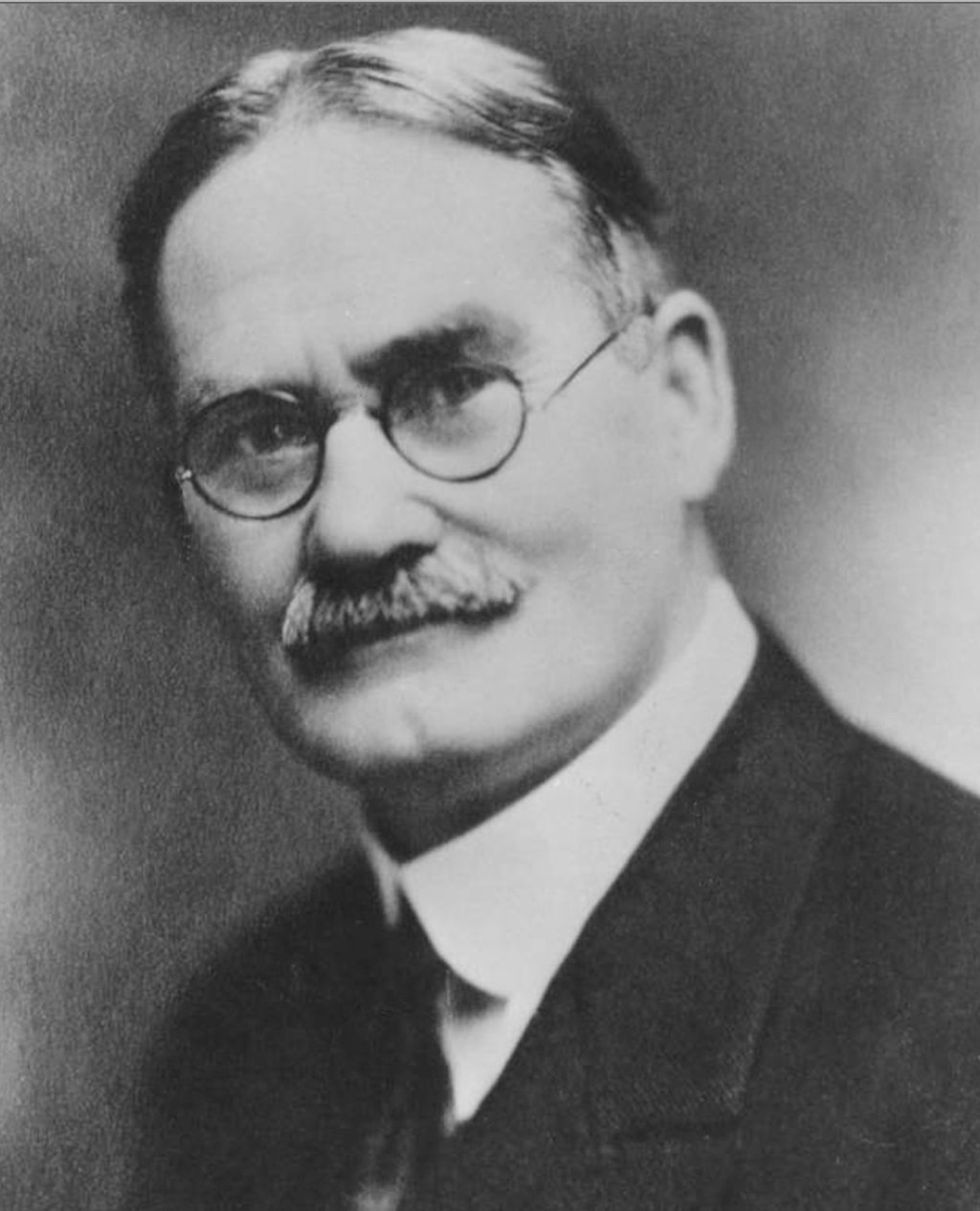 Portrait photograph of Dr. James Naismith.