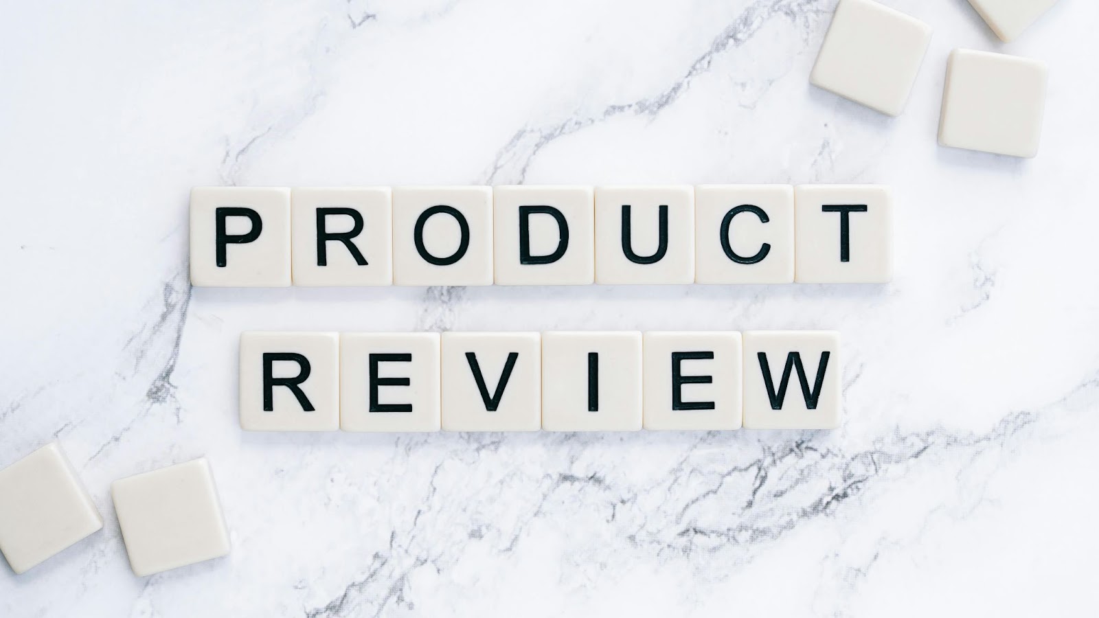 Product review tiles on white marbled background for All Things Austria