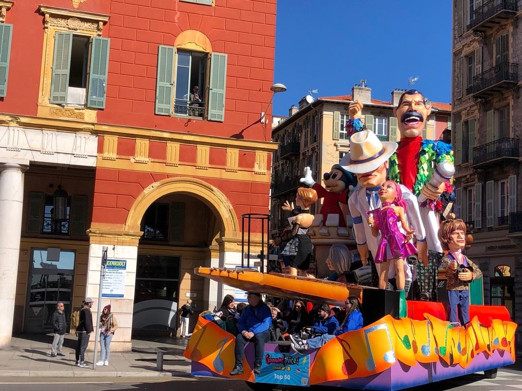 A float with a group of people on it

Description automatically generated