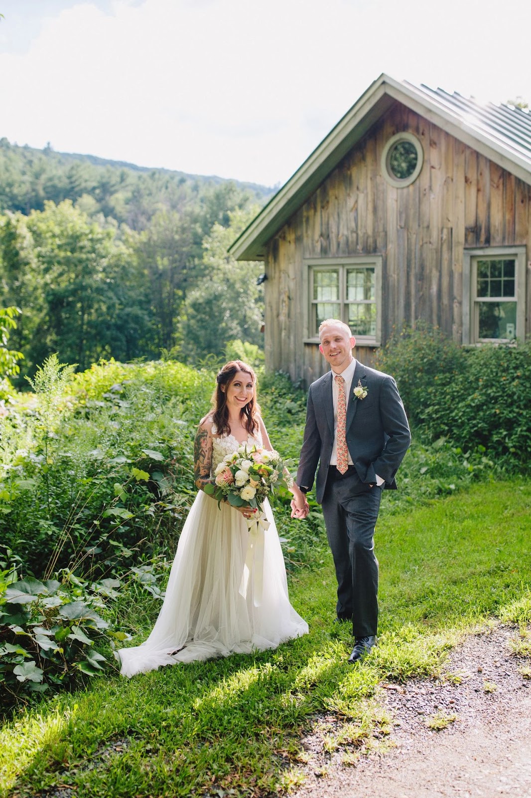 Bride and Groom holding hands outside