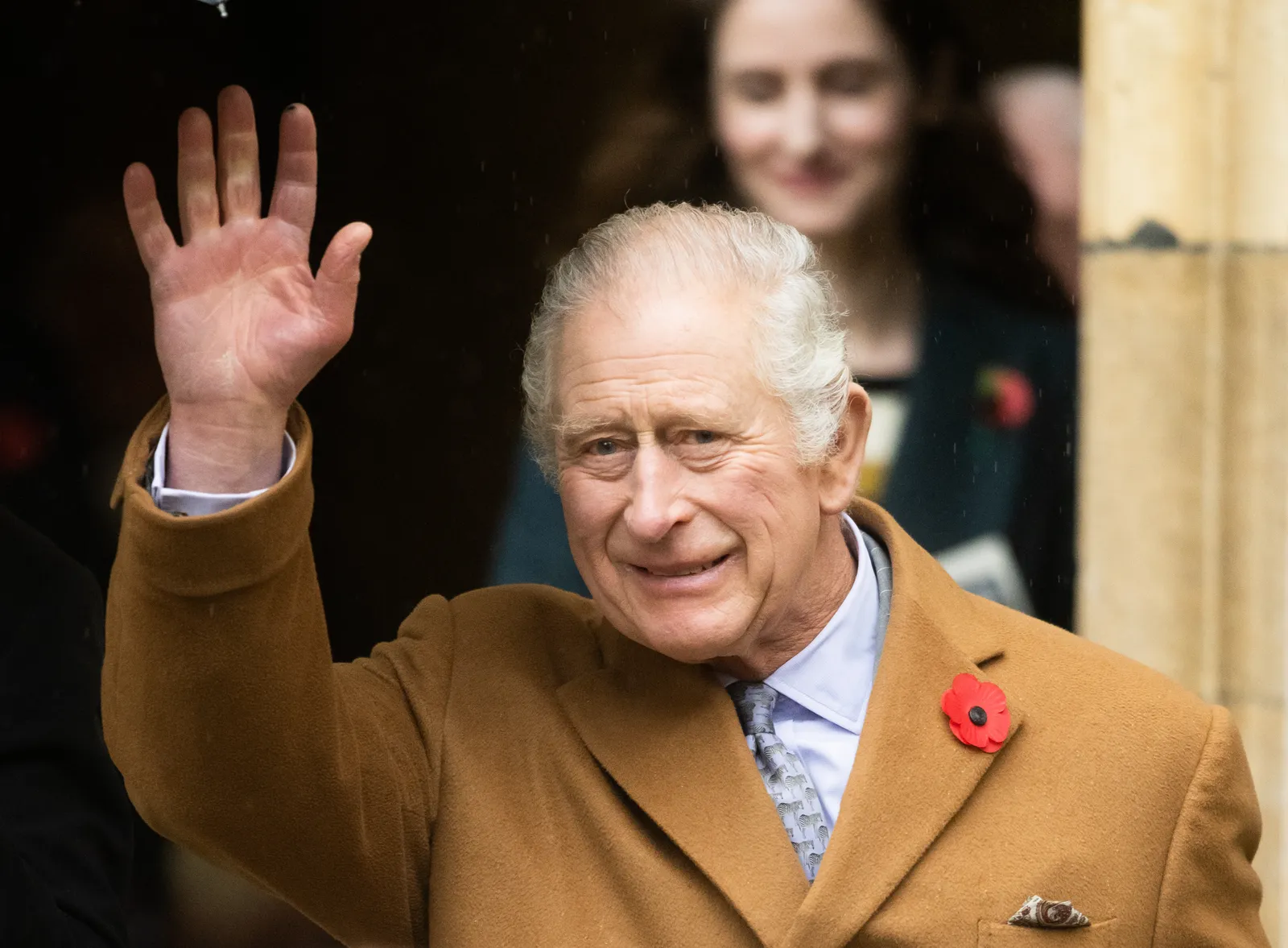 King Charles waving to the public