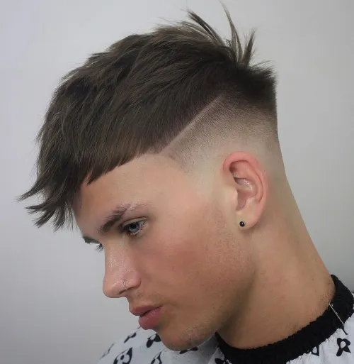 Picture showing a guy rocking the Widow’s Peak Edgar Haircut with Lines