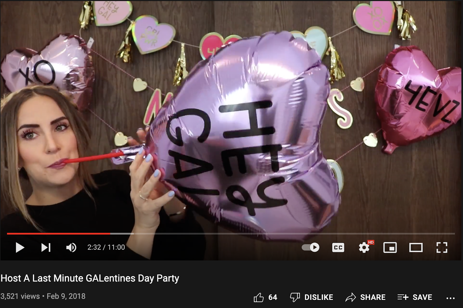 Screenshot of YouTube influencer blowing up a heart-shaped balloon that says "Hey Gal" for a video titled: Host A Last Minute GALentines Day Psrty