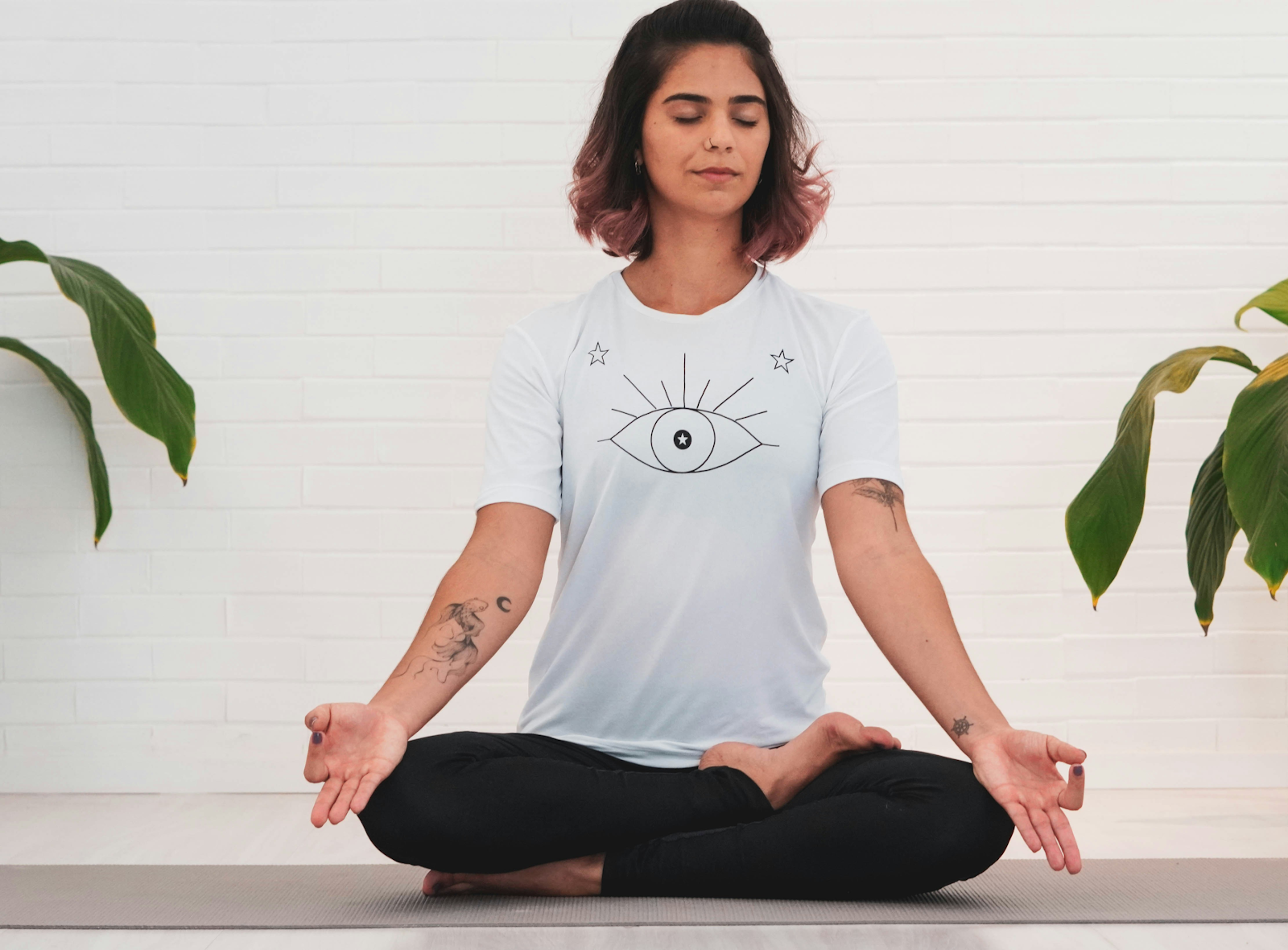 Woman learning to meditate with mudras. 