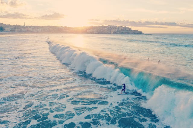 A view of the ocean with surfers