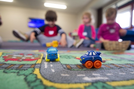 Children planning together at daycare.