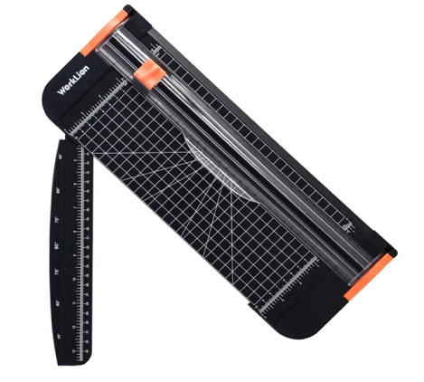 A black and orange paper cutter Description automatically generated