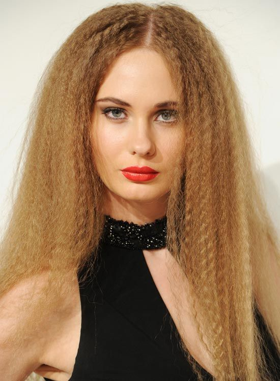 Picture  of   a gorgeous lady wearing a blond crimped hair