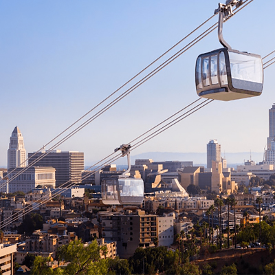 cable car in a cityscape renerong by Kilograph studio