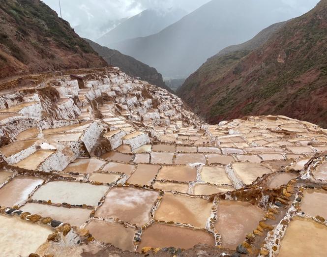 A salt pans in a valley

Description automatically generated