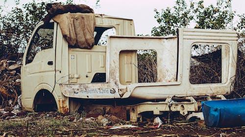 Free Broken Abandoned Car on Derelict Site Stock Photo