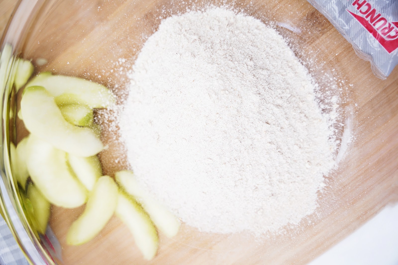 The baking kit includes fresh apples and dry ingredients.