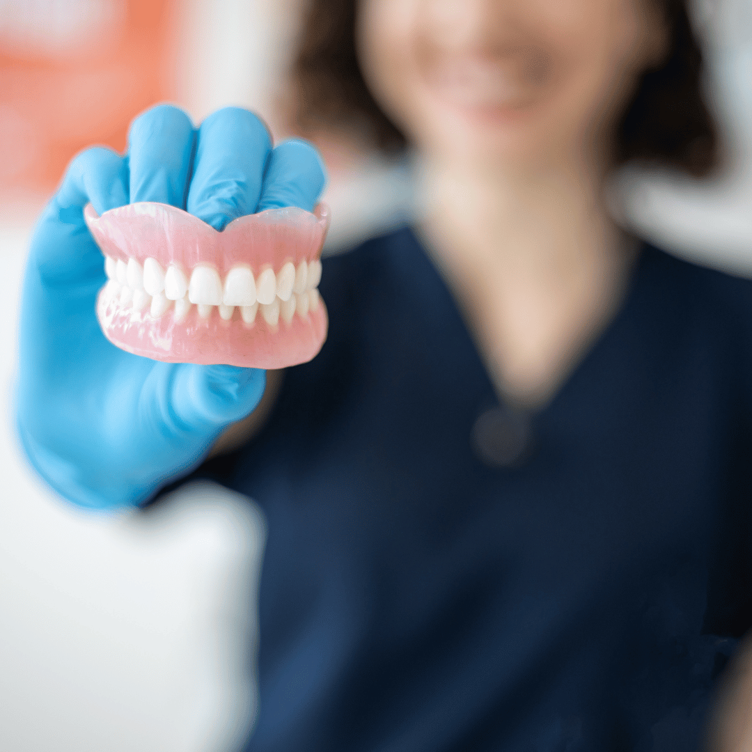 What is the Difference Between Veneers and Dentures?