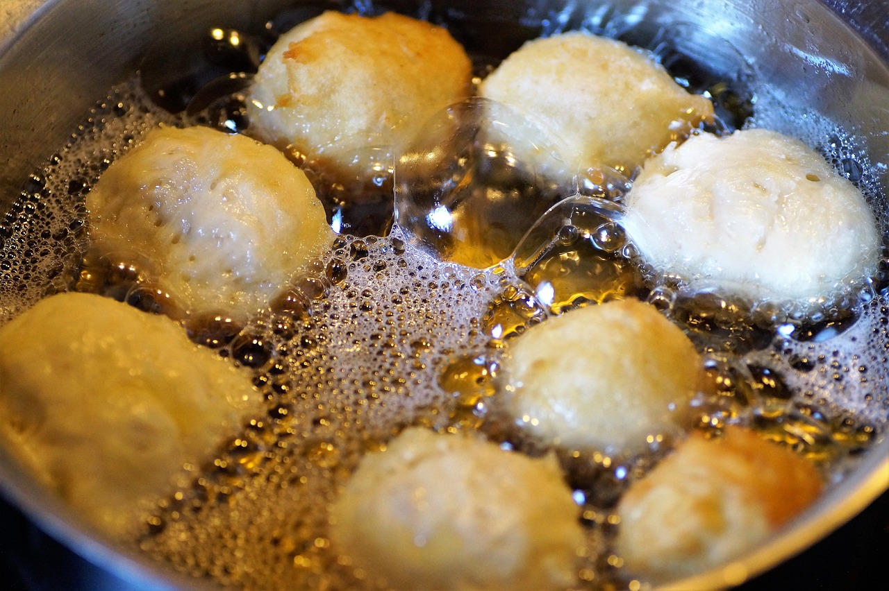 donuts frying in oil